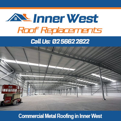 Interior view of commercial metal roofing in Inner West for large warehouse with steel framework