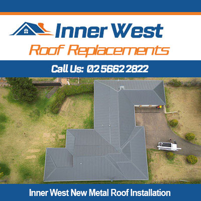 Aerial view of new metal roof installation in Inner West for residential home construction
