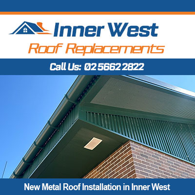 New metal roof installation in Inner West for commercial building with green corrugated roofing